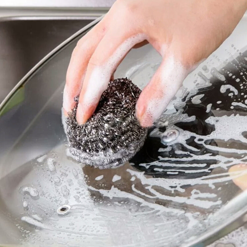 Round stainless steel scrubber pack of 6 for effective kitchen cleaning.