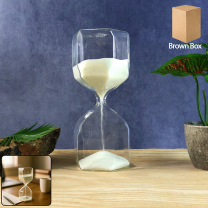 Clear glass hourglass timer with white sand showing elegant design for desk decor