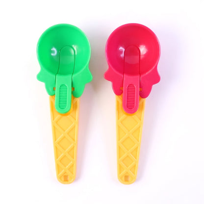 Colorful green and red plastic scoops designed for frozen desserts.