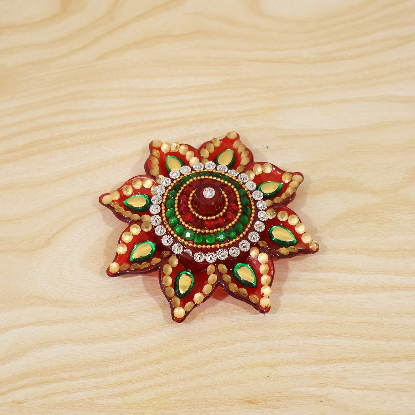 Live setup of the kumkum dani during a pooja ceremony.