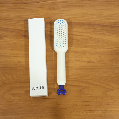 The Self-Cleaning Hairbrush removing trapped hair instantly after use