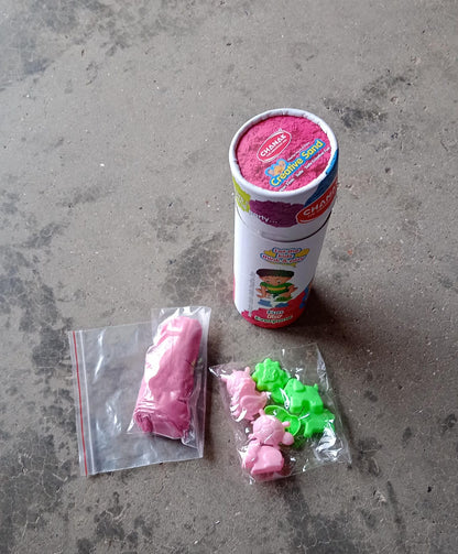 Detailed close-up showing the unique texture and blend of colorful kinetic sand.