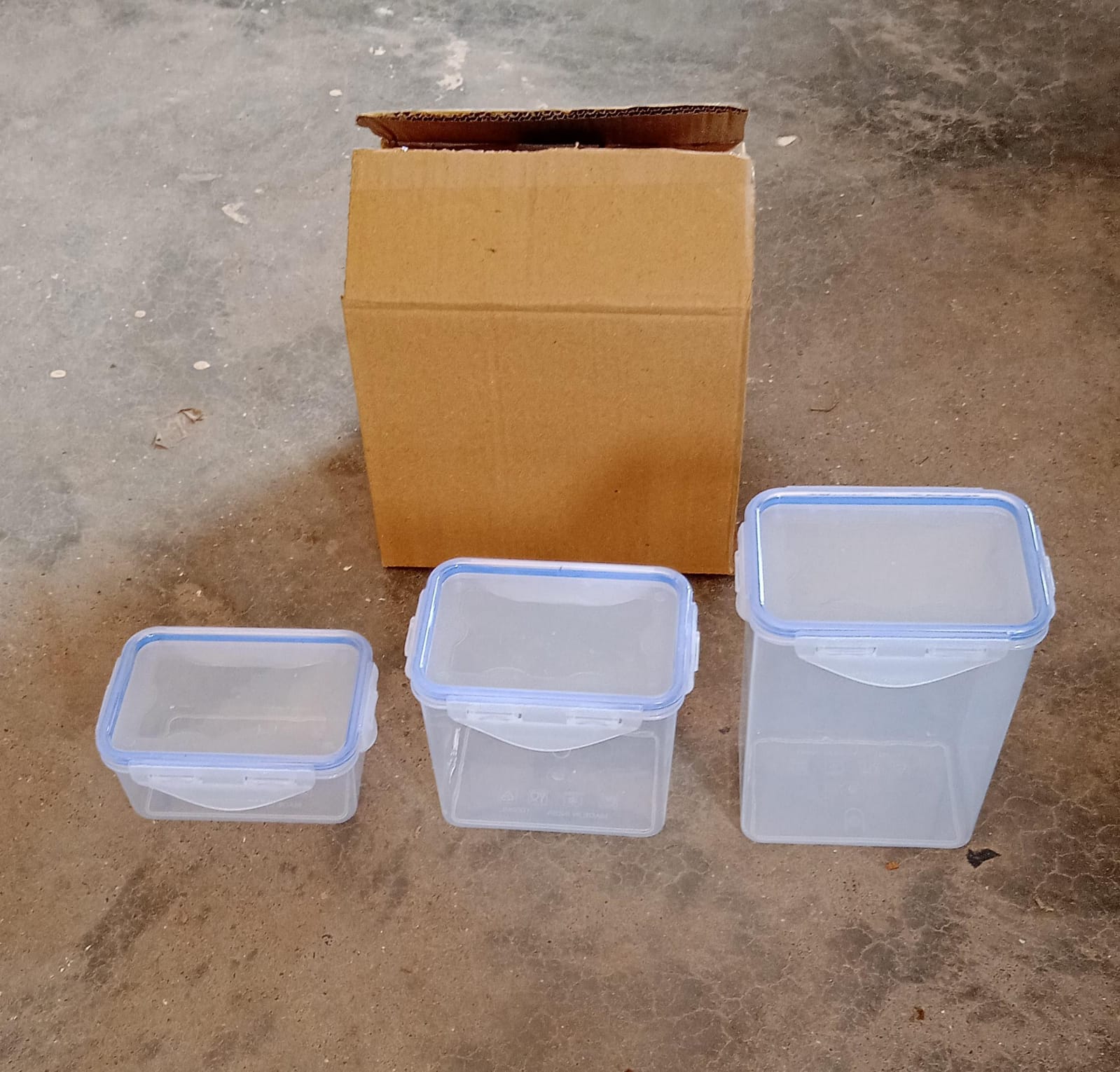 Airtight plastic jars with secure blue locking lids, perfect for keeping food fresh.