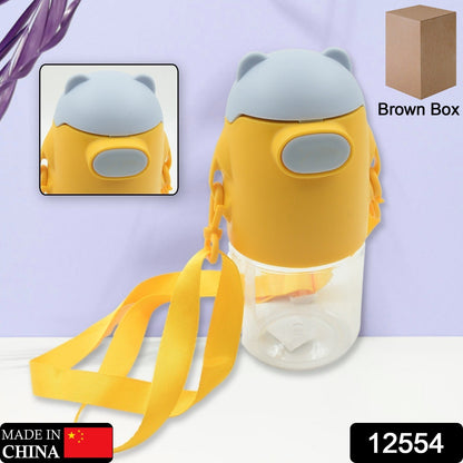 A portable water bottle with an adjustable shoulder strap displayed on a wooden table.