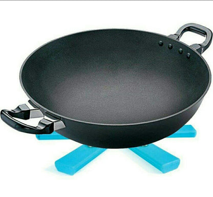 Portable foldable hotmat protecting a dining table from a serving dish.
