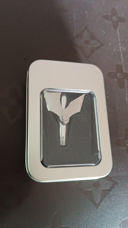Nose hair remover stored safely in its protective metal case